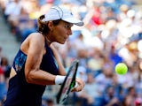 Varvara Lepchenko of the United States returns a shot to Victoria Azarenka of Belarus in their Women's Singles Fourth Round match on Day Eight of the 2015 US Open at the USTA Billie Jean King National Tennis Center on September 7, 2015