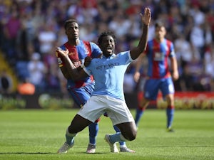 Man City's Wilfried Bony is brought down by Crystal Palace's Wilfried Zaha on September 12, 2015