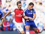 Aaron Ramsey and Eden Hazard tussle during the game between Chelsea and Arsenal on September 19, 2015