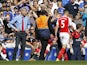 Arsenals French manager Arsene Wenger (L) reacts after the sending off of Arsenals Brazilian defender Gabriel (R) during the English Premier League football match between Chelsea and Arsenal at Stamford Bridge in London on September 19, 2015