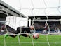 Saido Berahino (obscured) of West Bromwich Albion scores his team's first goal past Brad Guzan of Aston Villa during the Barclays Premier League match between Aston Villa and West Bromwich Albion at Villa Park on September 19, 2015 in Birmingham, United K
