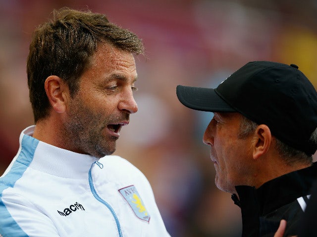Tim Sherwood Manager of Aston Villa and Tony Pulis manager of West Bromwich Albion greet prior to the Barclays Premier League match between Aston Villa and West Bromwich Albion at Villa Park on September 19, 2015 in Birmingham, United Kingdom