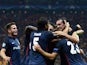 Atletico Madrid's Antoine Griezmann celebrates with his team mates after scoring the second goal during the Champions League group C football match Galatasaray vs Atletico Madrid on September 15, 201