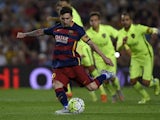 Barcelona's Argentinian forward Lionel Messi kicks to score on a penalty kick during the Spanish league football match FC Barcelona vs Levante UD at the Camp Nou stadium in Barcelona on September 20, 2015.