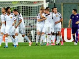 Basel's midfielder Birkir Bjarnason (C) celebrates with teammates after scoring a goal during the UEFA Europa League football match between Fiorentina and Basel on September 17, 2015