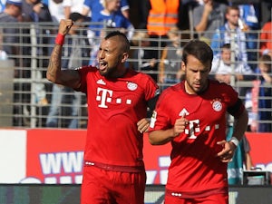 Vidal fires Bayern to half-time lead