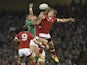 Canada's wing Jeff Hassler (R) jumps for the ball during a Pool D match of the 2015 Rugby World Cup between Ireland and Canada at the Millenium stadium in Cardiff, south Wales on September 19, 2015.