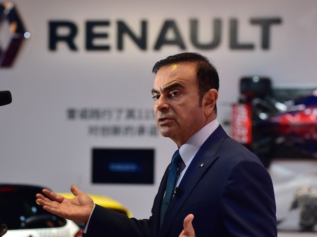 Chairman and CEO of Nissan and Renault Carlos Ghosn speaks during an interview at the 16th Shanghai International Automobile Industry Exhibition in Shanghai on April 20, 2015. Global car makers showed off hundreds of vehicles in China's commercial hub Sha