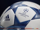 The UEFA logo is pictured on an official match ball ahead of the UEFA Champions League