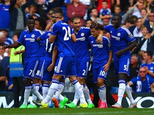 Eden Hazard (2nd R) of Chelsea celebrates scoring his team's second goal with his team mates during the Barclays Premier League match between Chelsea and Arsenal at Stamford Bridge on September 19, 2015 