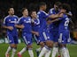 Chelsea's English defender Gary Cahill and Chelsea's English midfielder Ruben Loftus-Cheek (3R) congratulate Chelsea's Brazilian midfielder Willian (R) for scoring a goal during the UEFA Champions League, group G, football match between Chelsea and Maccab
