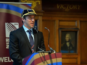 The USA rugby union captain Chris Wyles gives a speech in the Ward Room of the HMS Nelson building in Portsmouth, southern England on September 13, 2015, at their official Welcoming Ceremony for the 2015 Rugby Union World Cup that begins on September 18, 