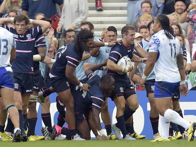The USA's Chris Wyles celebrates scoring a try during the Rugby World Cup game with Samoa on September 20, 2015