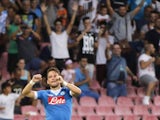 Napoli's Belgian forward Dries Mertens celebrates after scoring during the UEFA Europa League Group D football match SSC Napoli vs Club Brugge KV on September 17, 2015 at the San Paolo Stadium in Naples.
