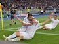 Oleh Husev of FC Dynamo Kiev celebrates with teammates after scoring during the UEFA Champions league group G football match between FC Dynamo Kiev and FC Porto at Olimpiysky stadium in Kiev on September 16, 2015