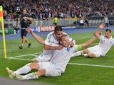 Oleh Husev of FC Dynamo Kiev celebrates with teammates after scoring during the UEFA Champions league group G football match between FC Dynamo Kiev and FC Porto at Olimpiysky stadium in Kiev on September 16, 2015