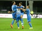 Leandro Paredes of Empoli FC is mobbed by team mates after scoring his team's first goal during the Serie A match between Udinese Calcio v Empoli FC at Stadio Friuli on September 19, 2015