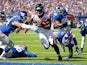 Tevin Coleman #26 of the Atlanta Falcons runs the ball past Mark Herzlich #94 and Uani' Unga #47 of the New York Giants for a first quarter touchdown at MetLife Stadium on September 20, 2015 in East Rutherford, New Jersey.