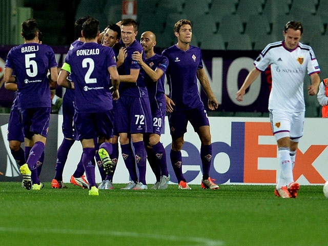 Fiorentina's players celebrate during the UEFA Europa League football match Fiorentina vs Basel on September 17, 2015 