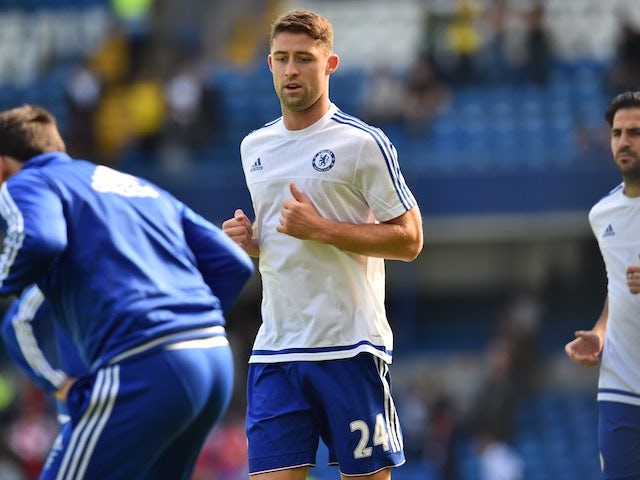Gary Cahill warms up prior to Chelsea's game with Arsenal at Stamford Bridge on September 19, 2015