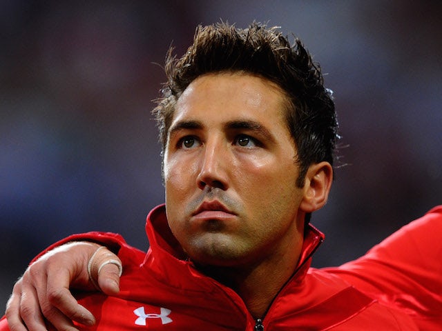 Gavin Henson of Wales lines up for the national anthems prior to kickoff during the rugby union international friendly match between Wales and England at the Millennium Stadium on August 13, 2011 in Cardiff, Wales. 