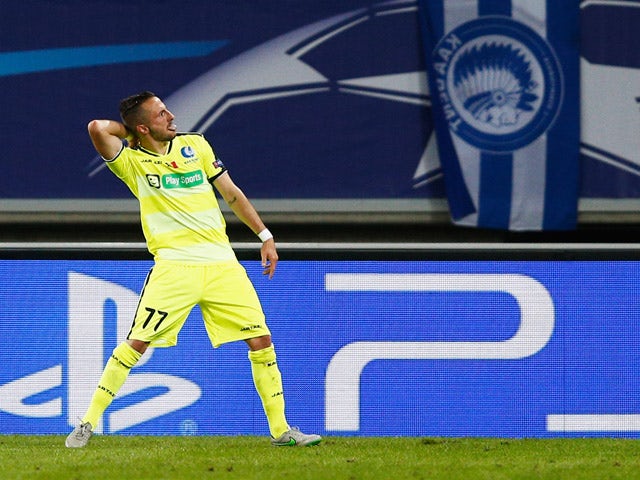 Danijel Milicevic of Gent celebrates scoring his teams first goal of the game during the UEFA Champions League Group H match between KAA Gent and Olympique Lyonnais held at Ghelamco Arena on September 16, 2015