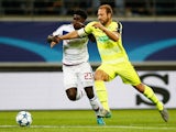 Laurent Depoitre of Gent battles for the ball with Samuel Umtiti of Lyon during the UEFA Champions League Group H match between KAA Gent and Olympique Lyonnais held at Ghelamco Arena on September 16, 2015