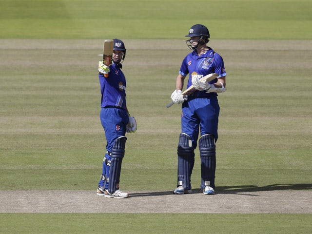 Geraint Jones of Gloustershire (L) acknowledges his 50 during the Royal London One-Day Cup Final between Surrey and Gloustershire at Lord's Cricket Ground on September 19, 2015