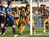 Eros Pisano of Hellas Verona celebrates after scoring the equalizing goal during the Serie A match between Atalanta BC and Hellas Verona FC at Stadio Atleti Azzurri d'Italia on September 20, 2015