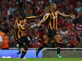 Daniel Cousin of Hull City celebrates with teammates after scoring during the Barclays Premier League match between Arsenal and Hull City at the Emirates Stadium on September 27, 2008