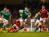 Jared Payne of Ireland looks to offload to Keith Earls of Ireland during the 2015 Rugby World Cup Pool D match between Ireland and Canada at the Millennium Stadium on September 19, 2015