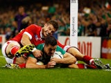 Jonathan Sexton of Ireland scores the third try for his team during the 2015 Rugby World Cup Pool D match between Ireland and Canada at the Millennium Stadium on September 19, 2015
