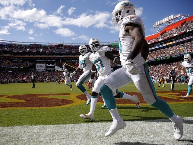 Jarvis Landry of the Miami Dolphins celebrates a touchdown against the Washington Redskins on September 13, 2015