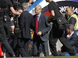 Jose Mourinho and Arsene Wenger shake hands prior to the game between Chelsea and Arsenal on September 19, 2015
