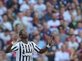 Juventus' French midfielder Paul Pogba celebrates after scoring a goal during the Italian Serie A football match between Genoa and Juventus on September 20, 2015