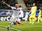 Christophe Jallet of Lyon celebrates scoring his teams first goal of the game during the UEFA Champions League Group H match between KAA Gent and Olympique Lyonnais held at Ghelamco Arena on September 16, 2015