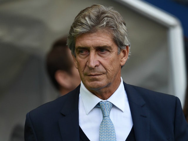 Manchester City's Chilean manager Manuel Pellegrini arrives for the English Premier League football match between Manchester City and West Ham United at The Etihad Stadium in Manchester, north west England on September 19, 2015. 