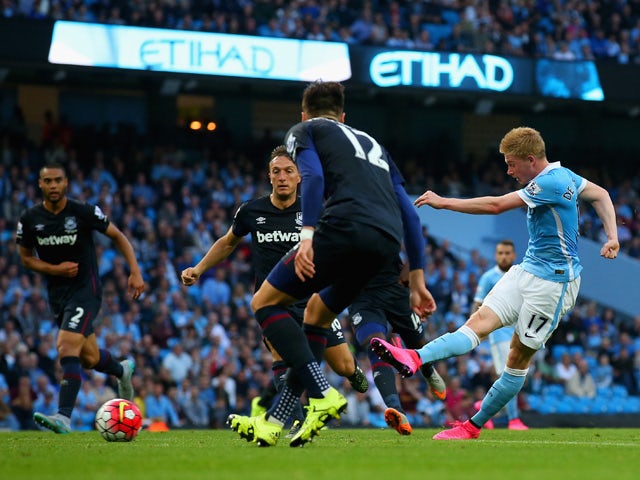 Kevin de Bruyne of Manchester City scores his team's first goal during the Barclays Premier League match between Manchester City and West Ham United at Etihad Stadium on September 19, 2015