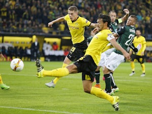 Late Ginter header pulls Dortmund level