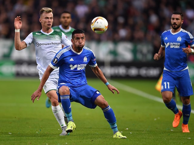 Marseille's Chilean Mauricio Isla (C) vies with Groningen's Slovenian Alkbert Rusnak during the UEFA Europe League Group F football match between FC Groningen and Olympique Marseille at the Euroborg stadium in Groningen, Netherlands on September 17, 2015.