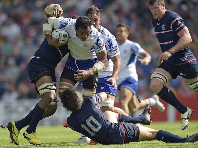 Samoa flanker Maurie Fa'asavalu is tackled during the Rugby World Cup game with the USA on September 20, 2015