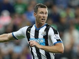 Mike Williamson of Newcastle United in action during the Capital One Cup Second Round between Newcastle United and Northampton Town at St James' Park on August 25, 2015 in Newcastle upon Tyne, England.