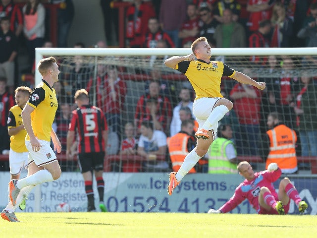 Sam Hoskins of Northampton Town celebrates after scoring his sides 2nd goal during the Sky Bet League Two match between Morecambe and Northampton Town at Globe Arena on September 19, 2015 in Morecambe, England.