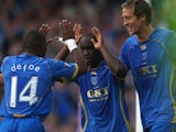 Lassana Diarra of Portsmouth celebrates with his team-mates after scoring the first goal for Portsmouth during the UEFA Cup round one first leg match between Portsmouth and Guimaraes at Fratton Park on September 18, 2008