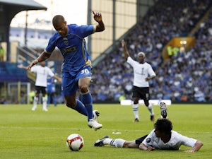 Portsmouth's Malian defender Djimi Traore vies with Guimaraes' Brazilian defender Andrezinho during their UEFA Cup, first round, first leg match against Vitoria Guimaraes at Fratton Park, Portsmouth, England, on September 18, 2008