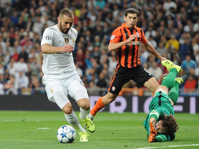 Karim Benzema of Real Madrid beats Andriy Pyatov of Shakhtar Donetsk, but does not socre during the UEFA Champions League Group A match between Real Madrid and Shakhtar Donetsk at estadio Santiago Bernabeu on September 15, 2015