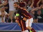 Alessandro Florenzi (L) with his teammate Daniele De Rossi of AS Roma celebrates after scoring the team's first goal during the UEFA Champions League Group E match between AS Roma and FC Barcelona at Stadio Olimpico on September 16, 2015