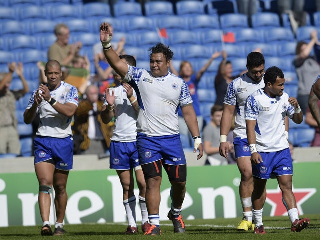Samoa's players celebrate after a Pool B match of the 2015 Rugby World Cup between Samoa and USA at the Brighton community stadium in Brighton, south east England, on September 20, 2015