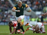 South Africa's hooker Adriaan Strauss runs through to score a try during a Pool B match of the 2015 Rugby World Cup between South Africa and Japan at the Brighton community stadium in Brighton, south east England on September 19, 2015