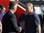 Southampton's Dutch manager Ronald Koeman (R) shakes hands with Manchester United's Dutch manager Louis van Gaal ahead of the English Premier League football match between Southampton and Manchester United at St Mary's Stadium in Southampton, southern Eng